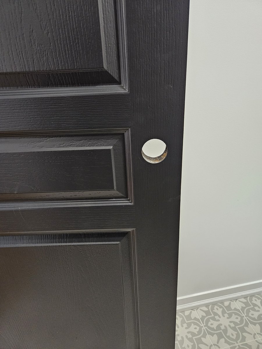 Door before hardware installation Okotoks